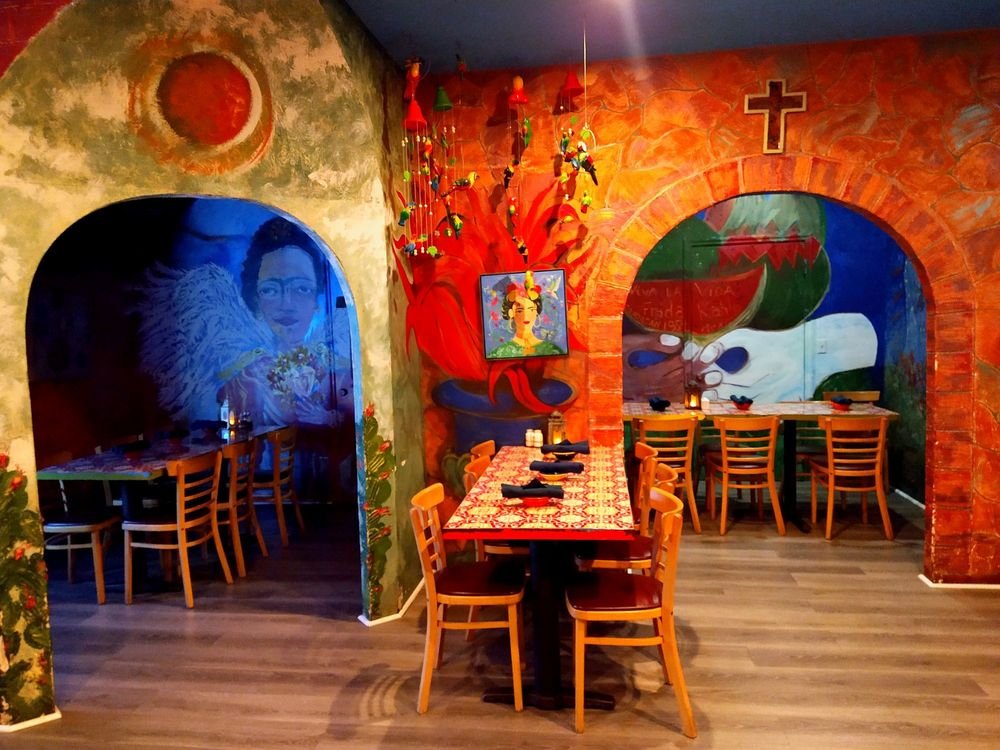 Interior arches with Frida Kahlo murals
