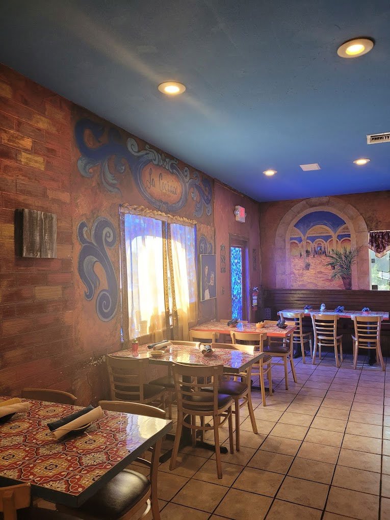 Interior with the La Cocina name painted on the wall